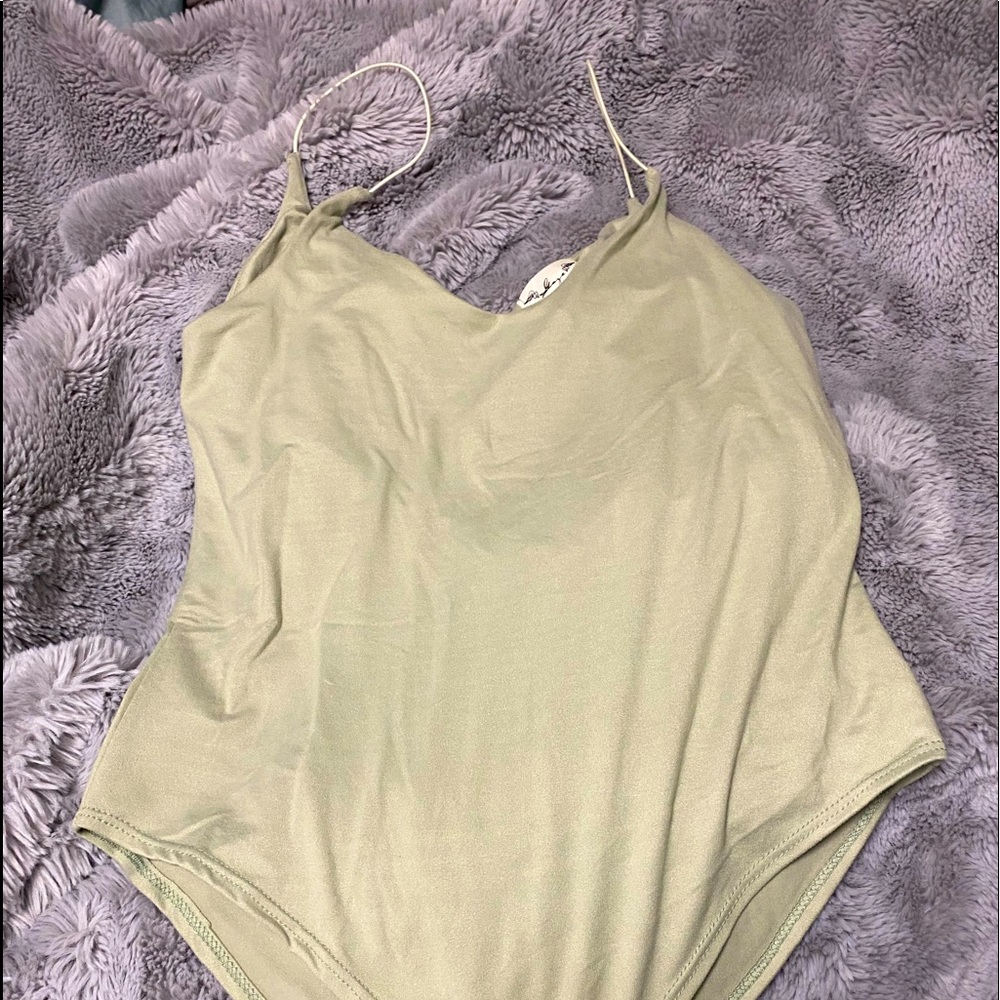 3/$10. Brand new light green olive tank bodysuit